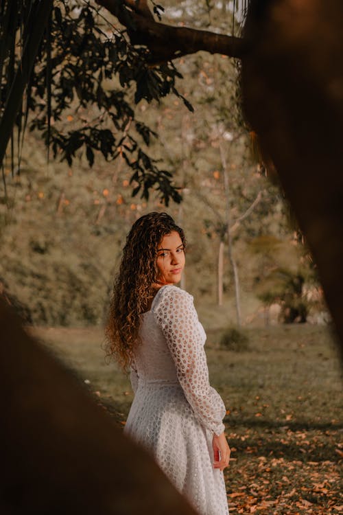 Curly Haired Woman Looking Back 