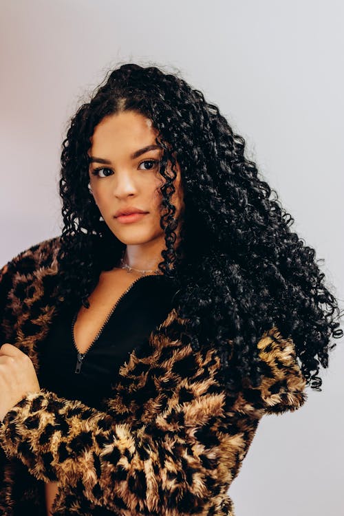 Young Woman in a Leopard Print Jacket 