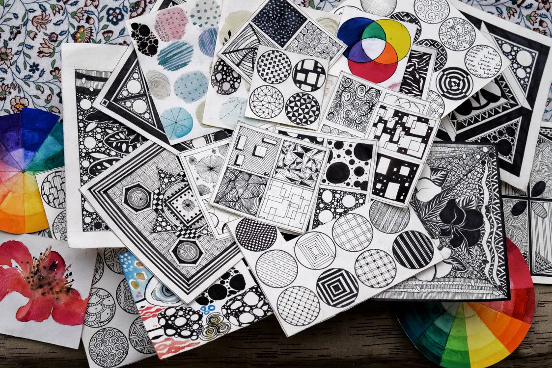 Free A collection of diverse geometric patterns and designs in monochrome and color. Stock Photo