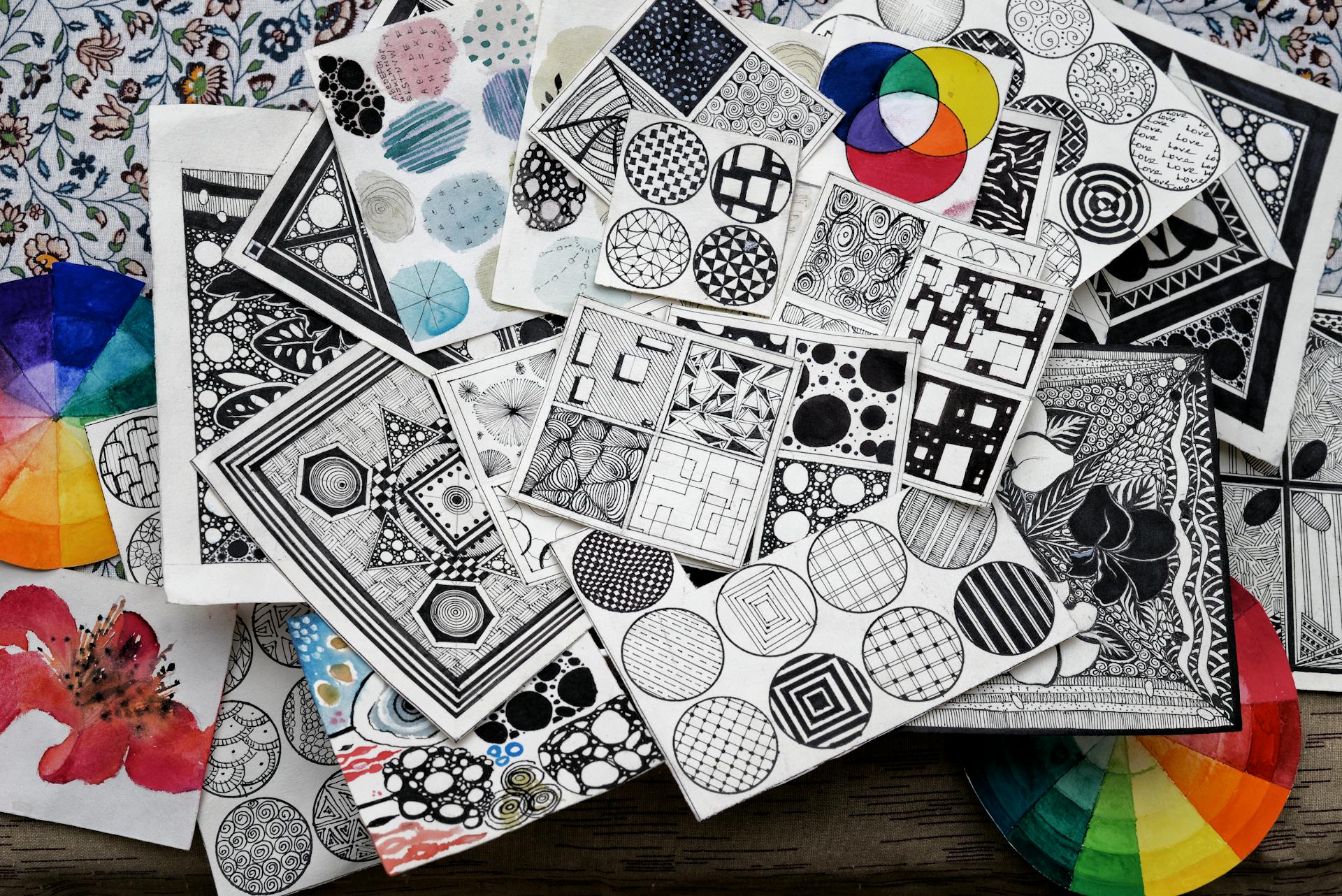 A collection of diverse geometric patterns and designs in monochrome and color.