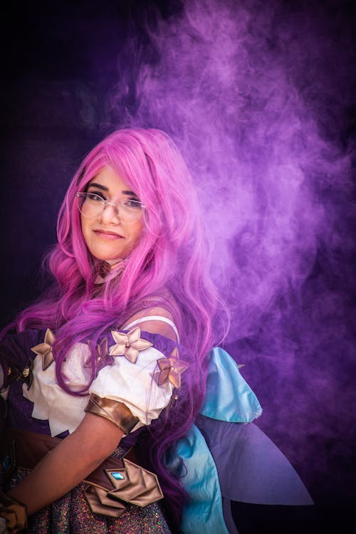 Woman in Purple Hair Wearing White and Black Long Sleeve Shirt