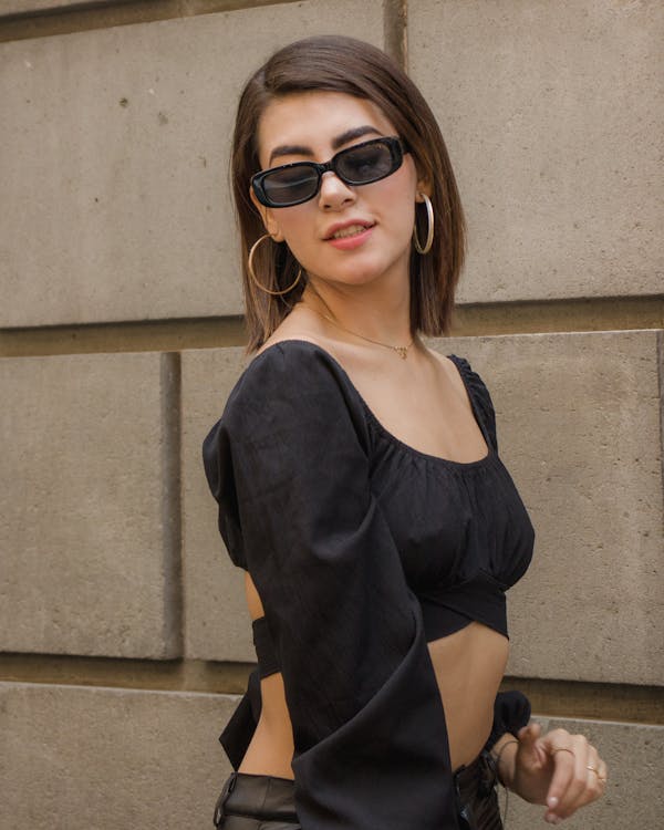 Woman in Black Scoop Neck Shirt Wearing Black Sunglasses · Free Stock Photo