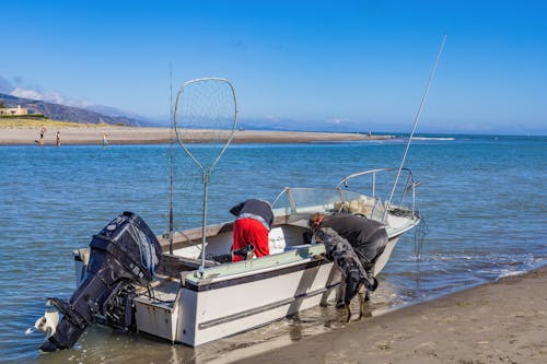 Foto profissional grátis de água, barco, barco de pesca