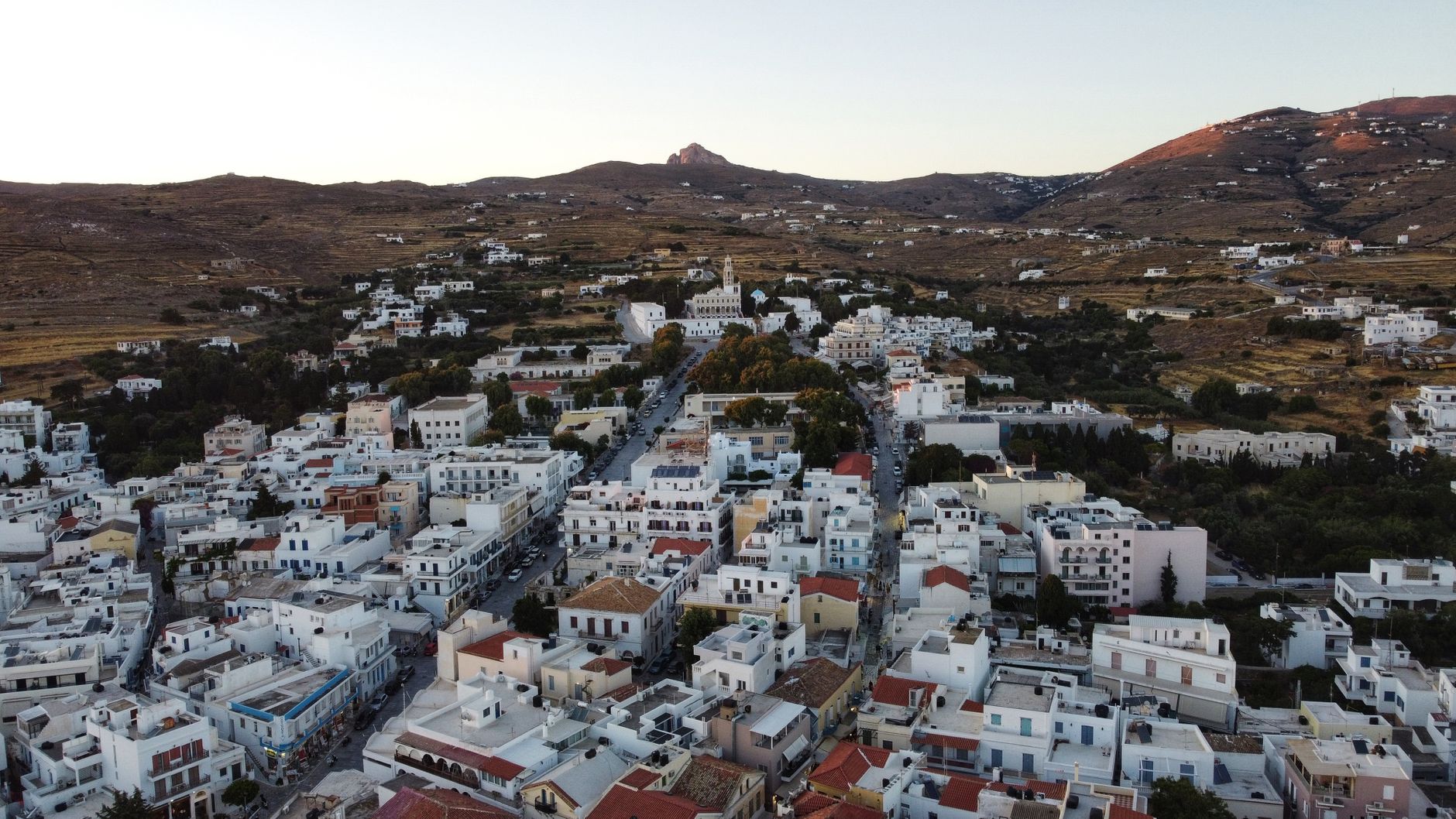 Beautiful landscape with traditional dove cotes on Tinos Island, Greece, showcasing historic architecture.