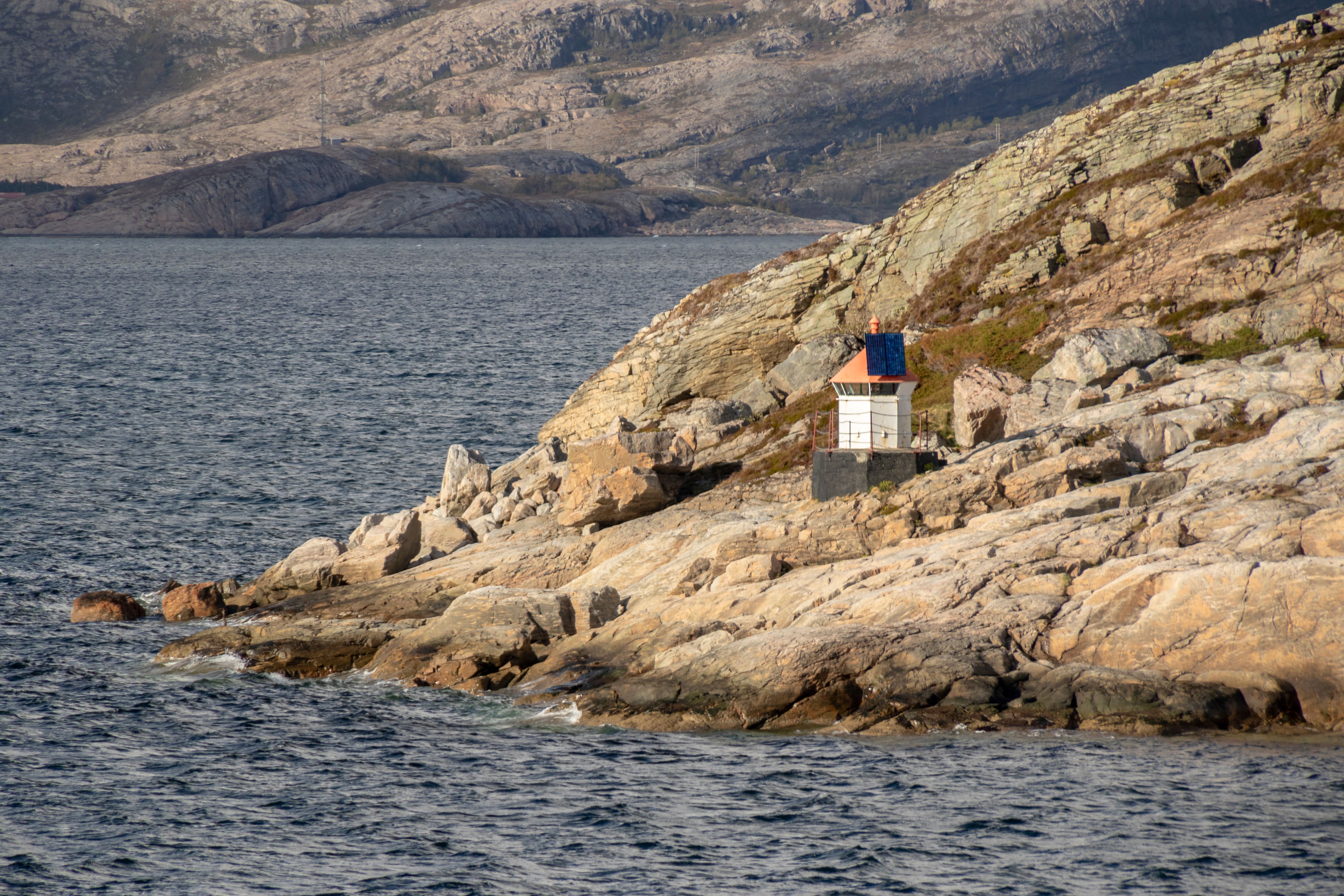 lighthouse rocky coast night