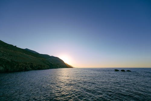 Fotos de stock gratuitas de aguas tranquilas, anochecer, cielo azul