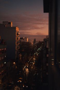 Captivating twilight view of Mar del Plata's cityscape, showcasing architectural beauty and bustling streets.