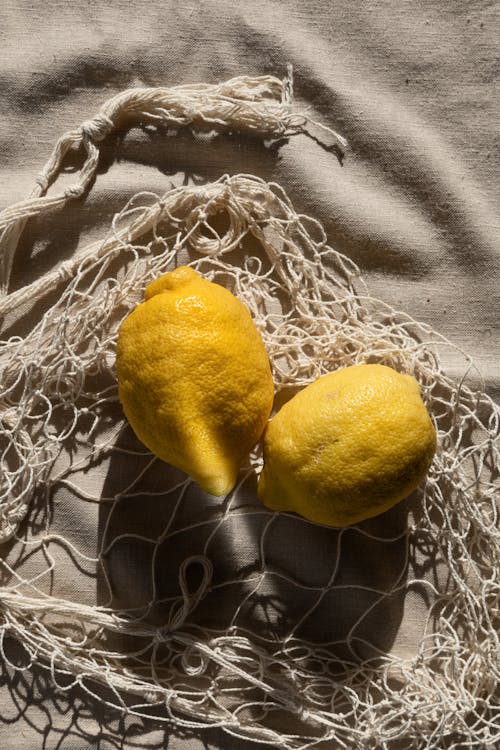 Yellow Lemon on White Textile