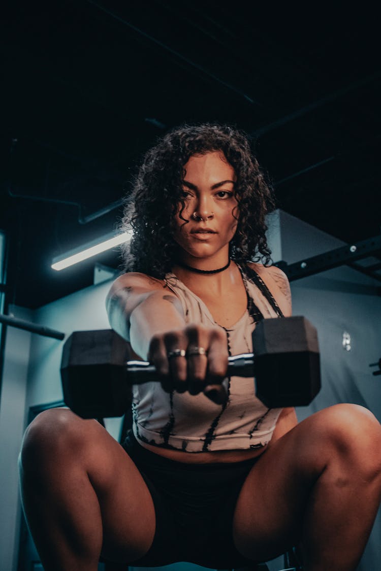 Portrait Of A Woman With A Dumbbell