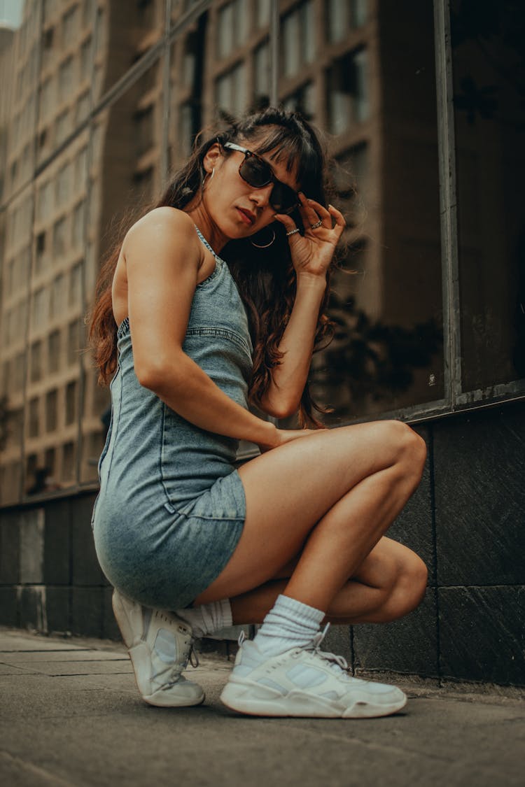 Woman In Denim Dress