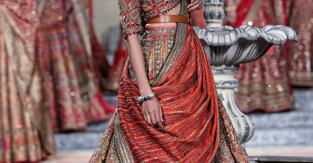 Traditional Look Modelling Model Standing in Traditional Dress · Free Stock Photo