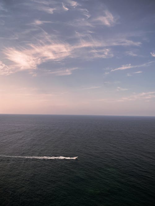 Aerial Photography of Ocean under the Sky
