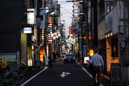 People Walking on Street during Night Time