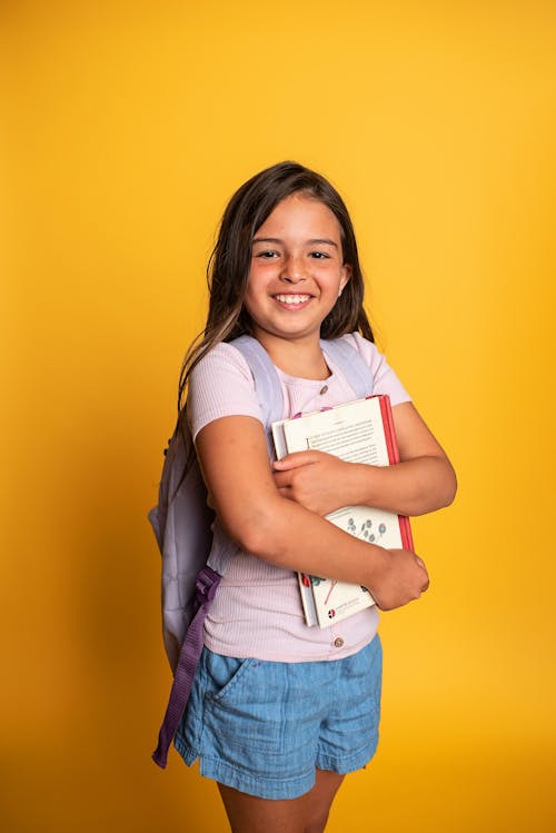 Free Cheerful Elementary Student Stock Photo