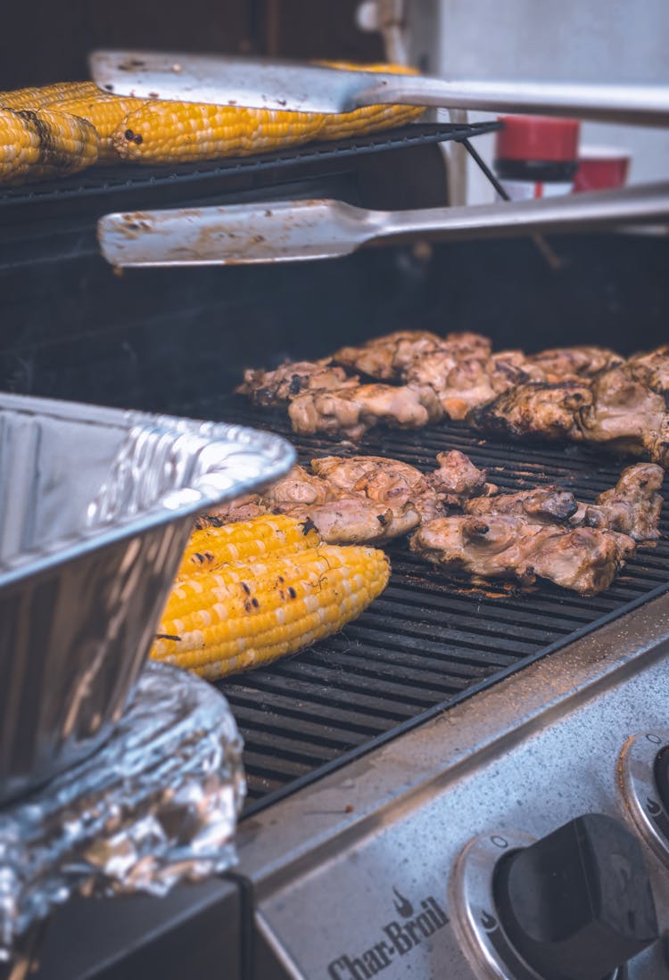 Meat And Corn On A Grill 