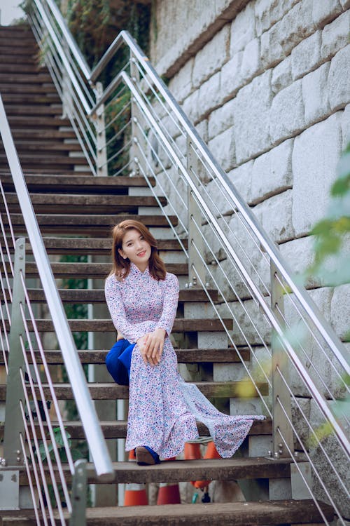 Free Woman Sitting On Stairs Stock Photo