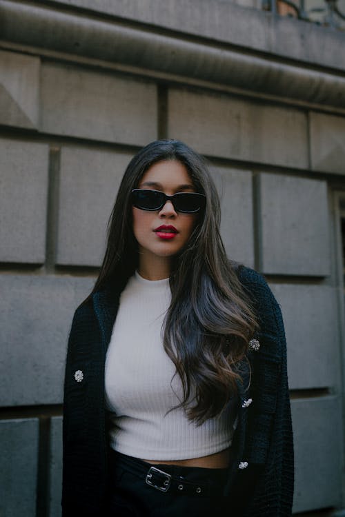 Brunette Fashionable Woman in Sunglasses Posing in City 