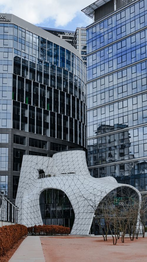 Free Contemporary office buildings and unique architectural structures in downtown Warsaw, Poland. Stock Photo