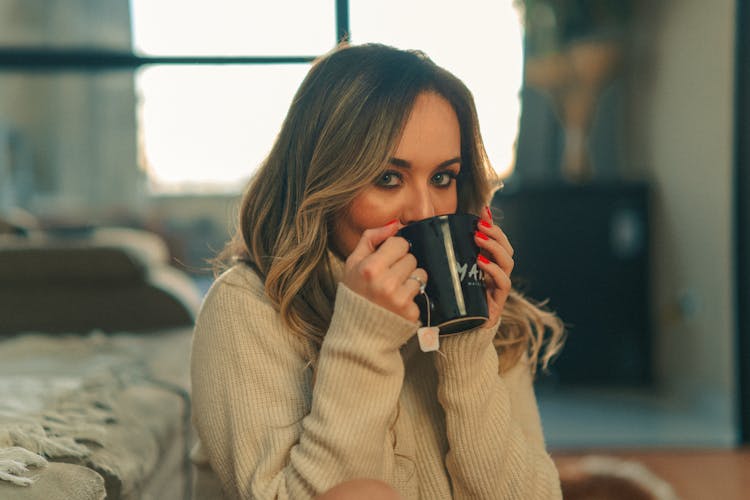 A Woman Drinking Tea 