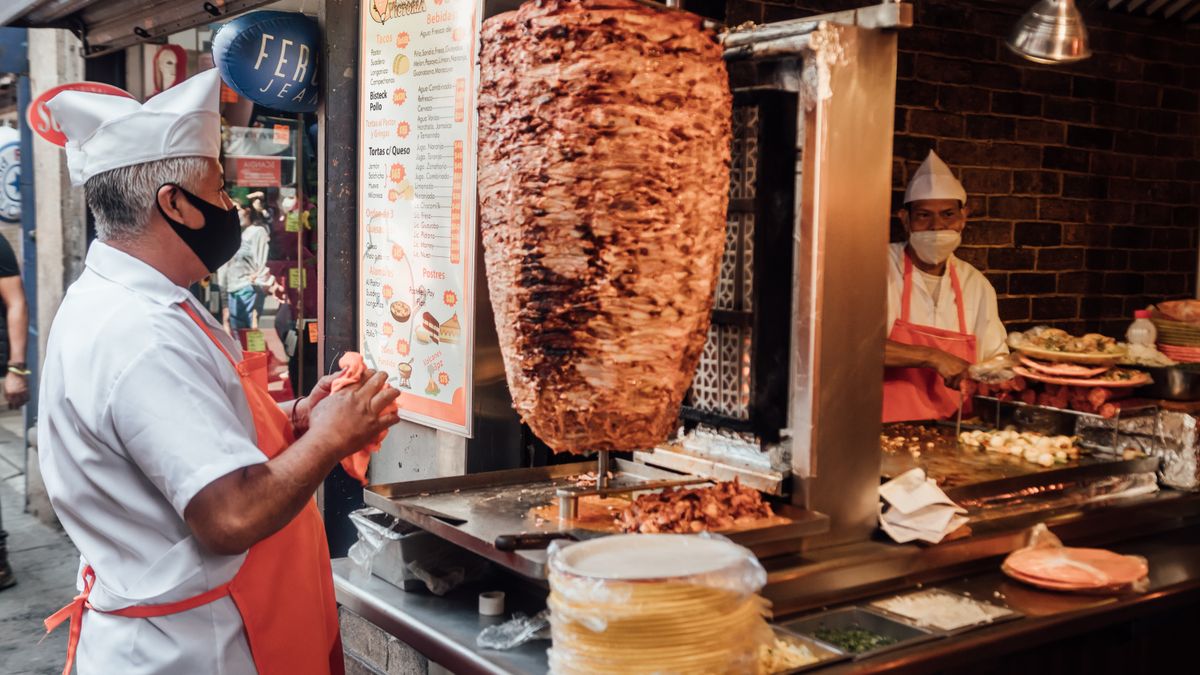 Street taco stand serving al pastor tacos in Mexico City