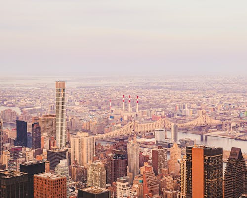 Aerial View of the Queensboro Bridge and Buildings around It in New York City 