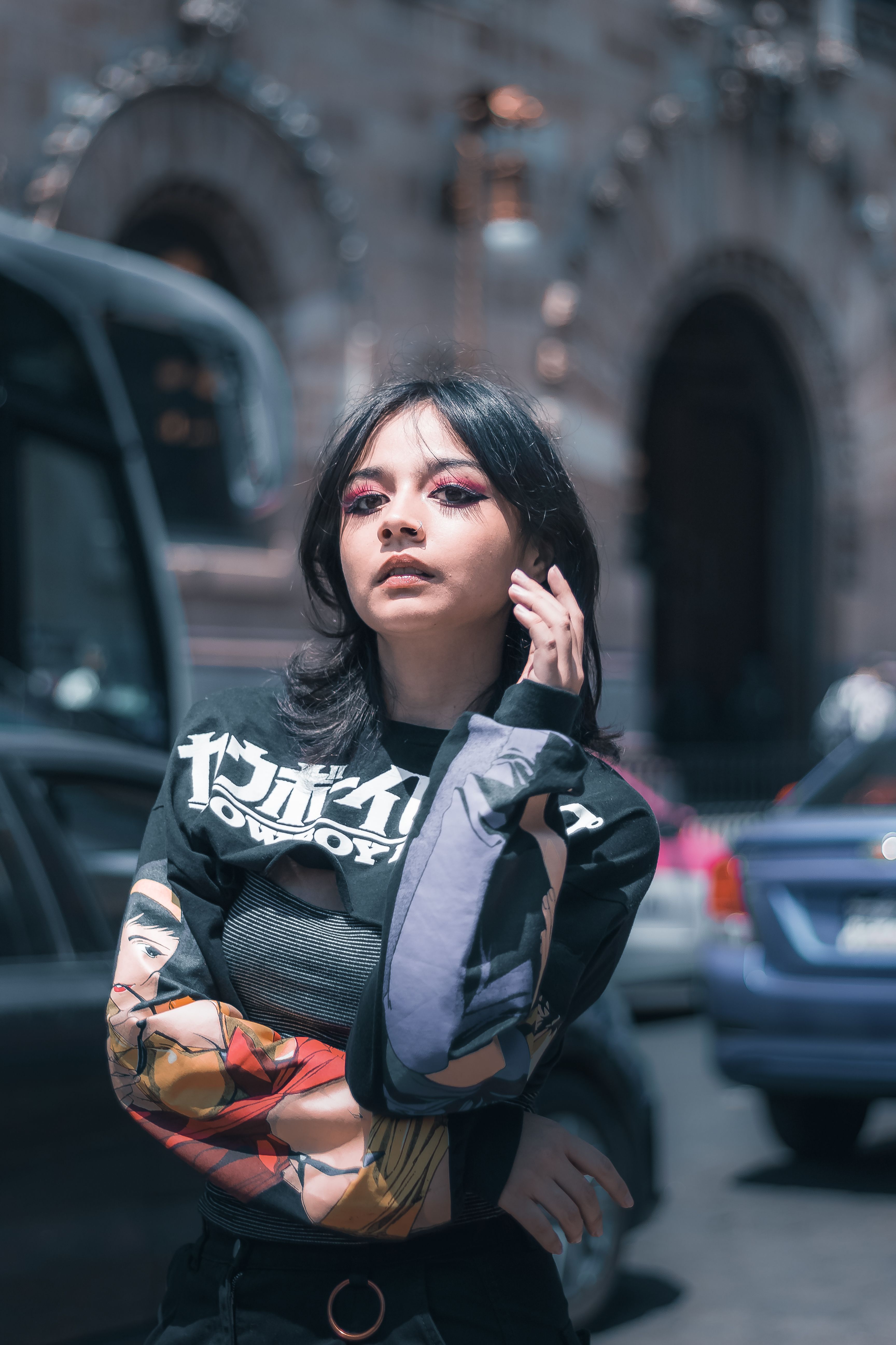 A Woman Posing on the Street · Free Stock Photo