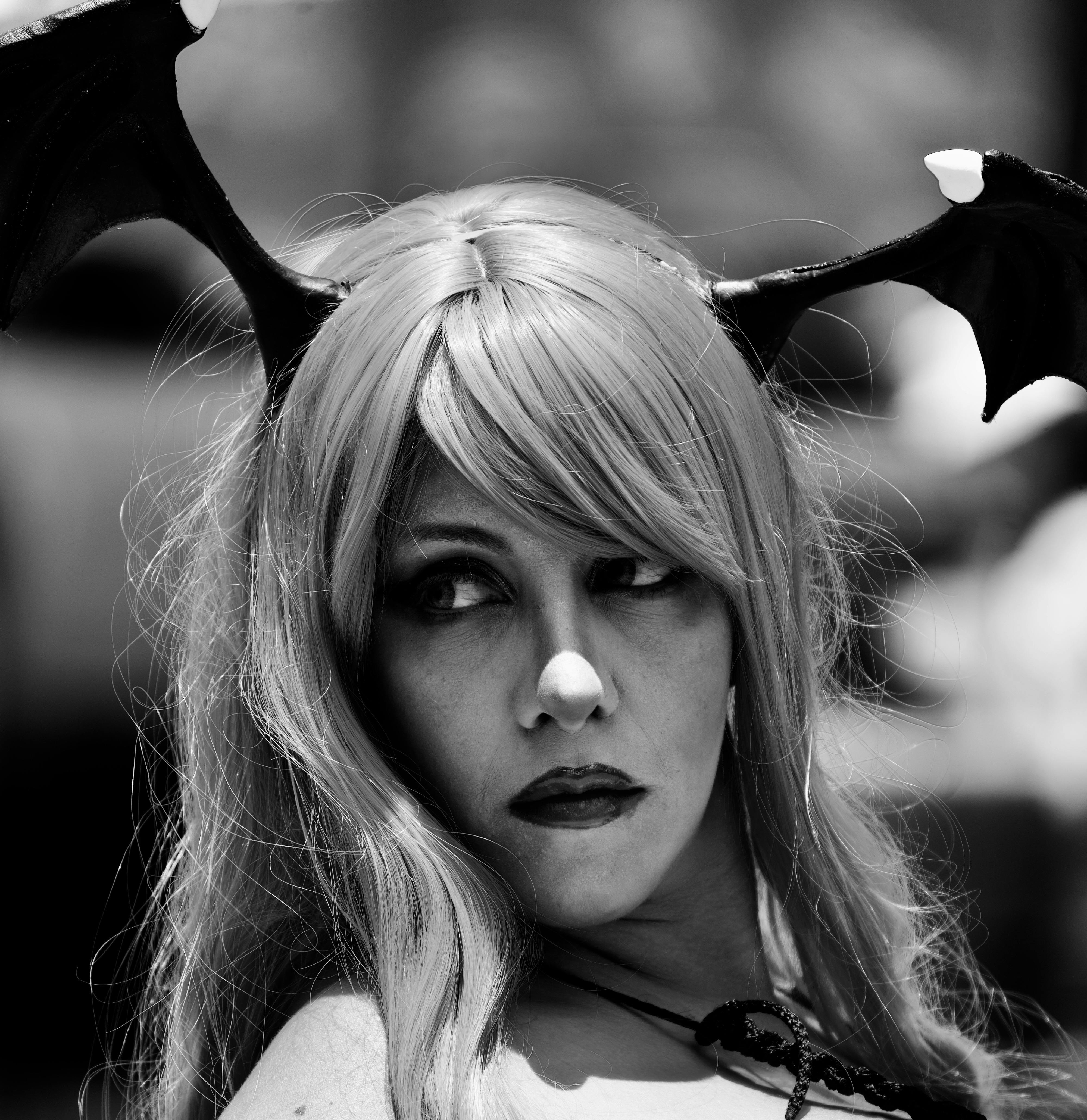 Grayscale Photo of a Woman Wearing a Costume · Free Stock Photo