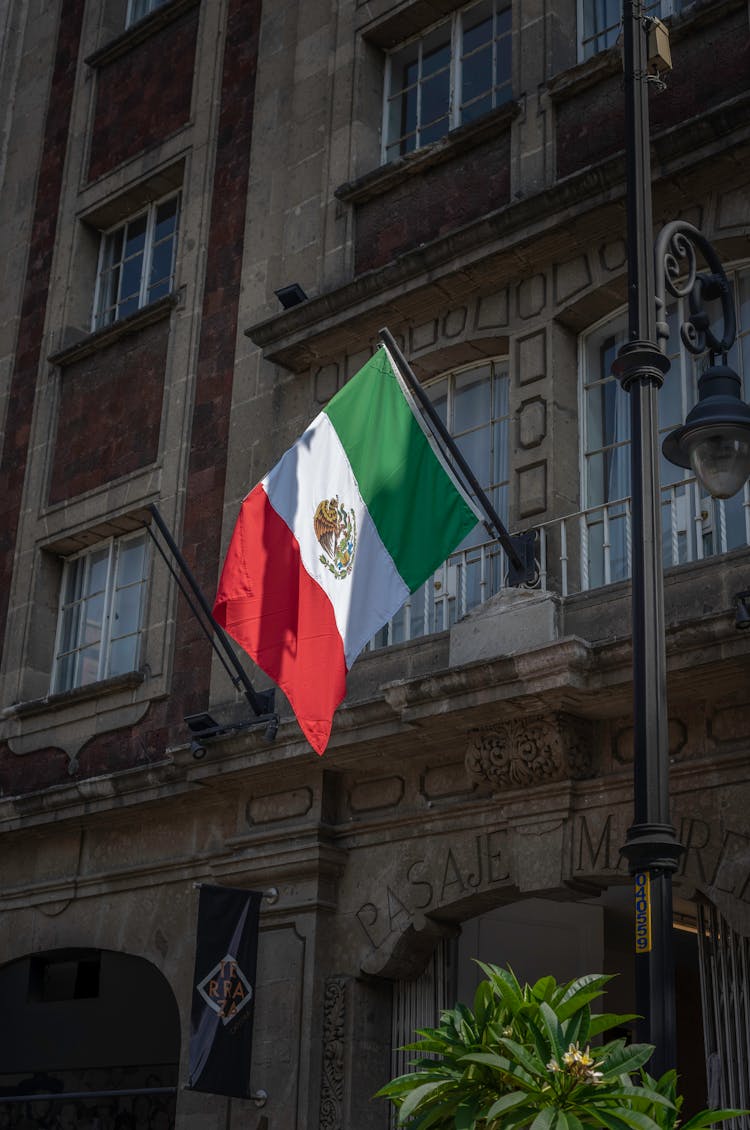 The Flag Of Mexico On A Building 