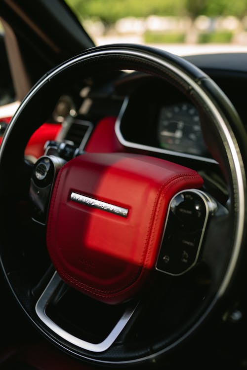 Red Steering Wheel in a Car 