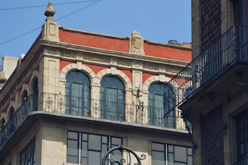 Windows and Balconies of Old Buildings