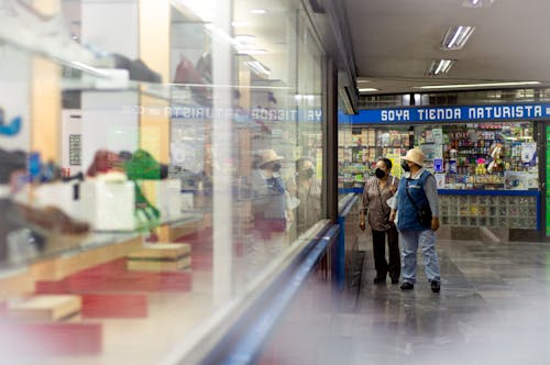 Elderly Couple Inside a Mall