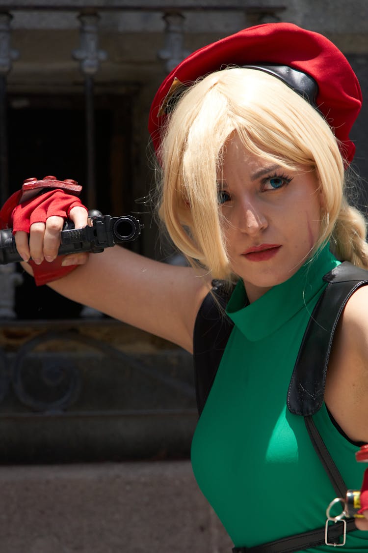 Cammy Cosplayer Holding A Gun