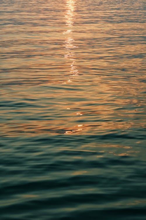 A Sun Reflection on Body of Water