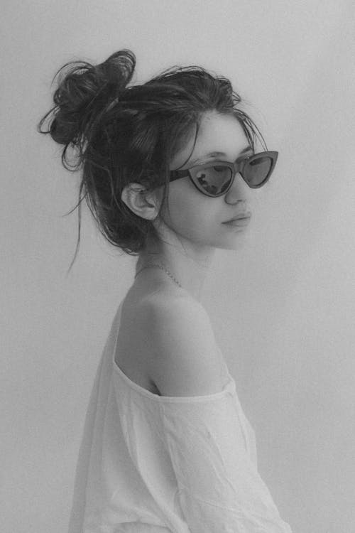 Grayscale Photo of a Woman With Sunglasses