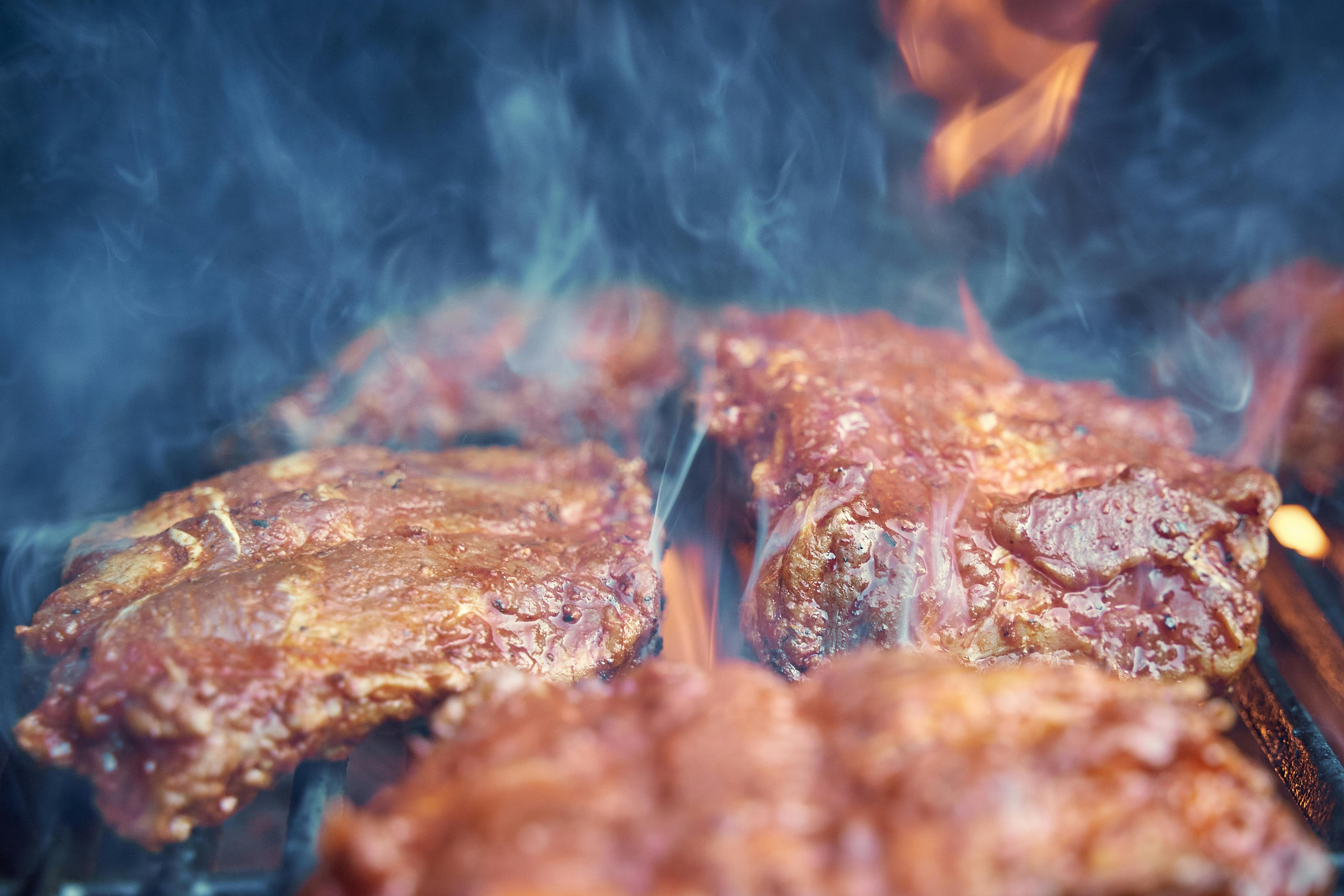 BBQ meat smoking low and slow with temperature monitoring