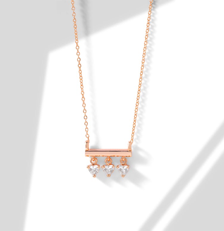 A Necklace With Diamond Studs