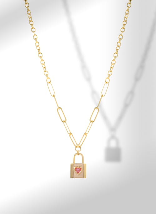 Photo of Gold Necklace With Padlock Pendant