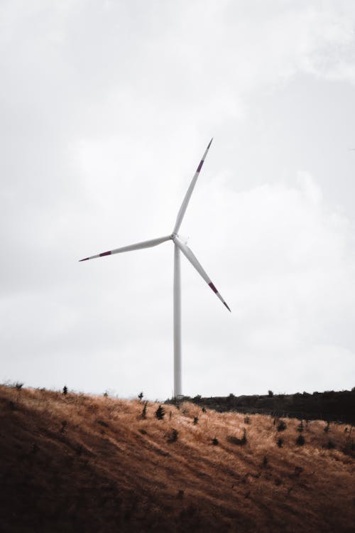 Free Clouds over Wind Turbine Stock Photo