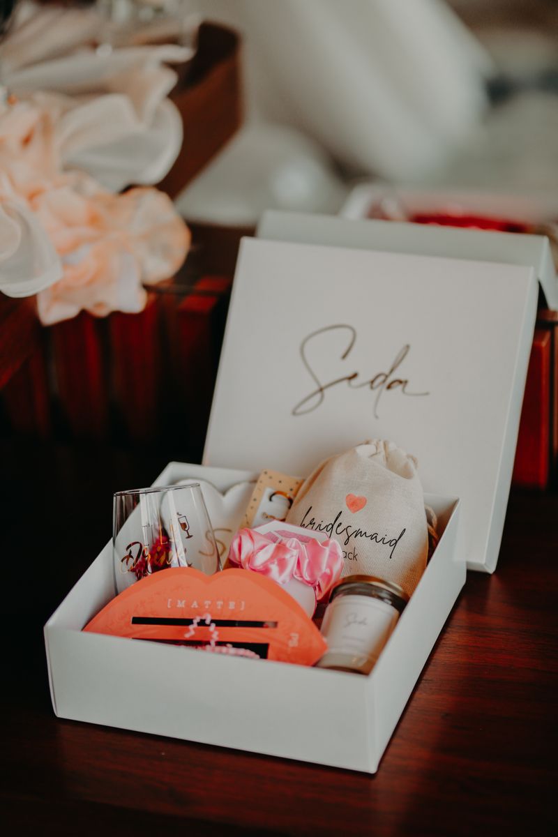 Close-up of a beautifully arranged bridesmaid gift box.