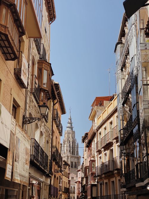 Free Vertical shot of an urban street with historical architecture in daylight. Stock Photo