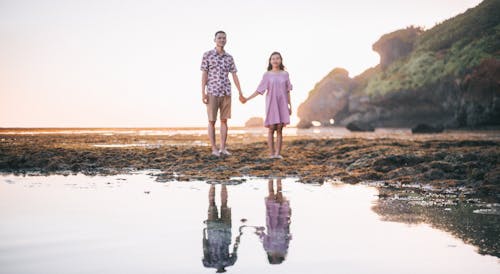 Free Portrait Photography of Man and Woman Holding Hands Stock Photo