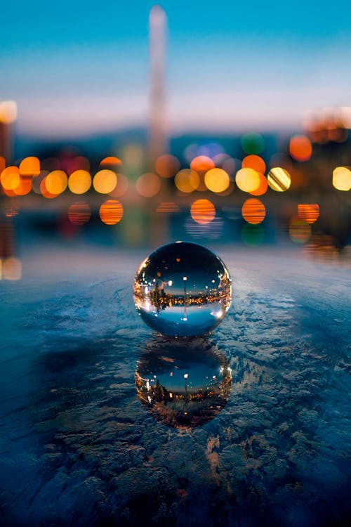 A Round Glass on a Blue Surface