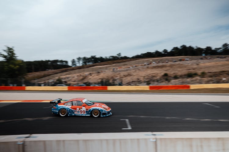 Photo Of Sports Car On Race Track