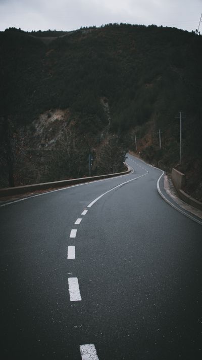 Mountain road at dusk, photo by Dajana Reçi on Pexels