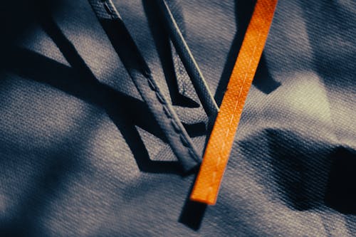 Orange Stripe over Gray Surface