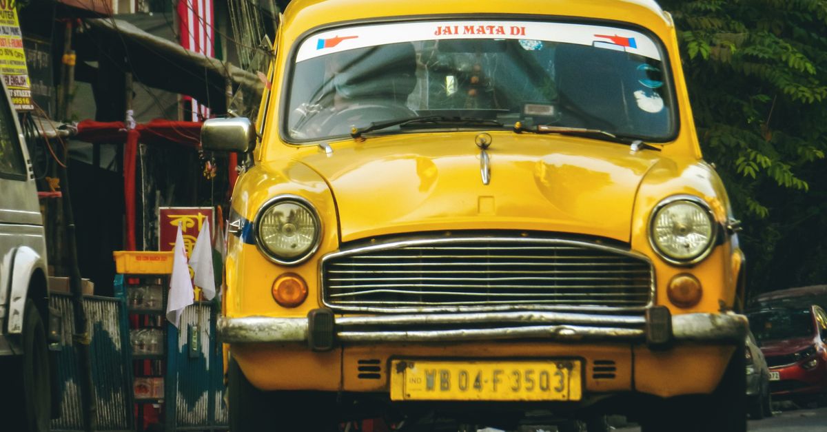 Yellow Taxi on the Road · Free Stock Photo