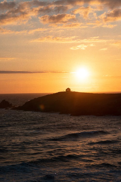 Photo of Ocean During Sunset