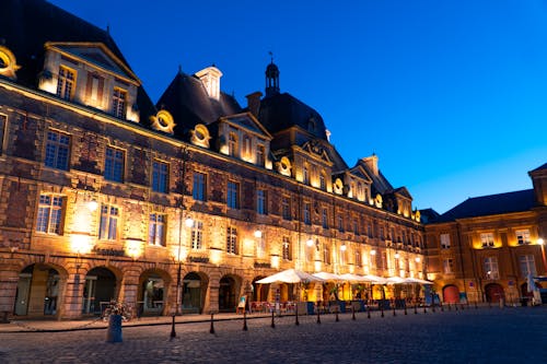 Town Square and Palace Building Exterior at Dusk 