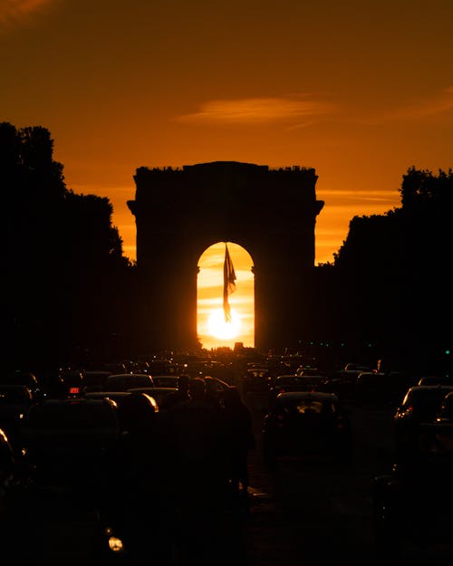 Photos gratuites de arc de triomphe, attraction touristique, coucher de soleil