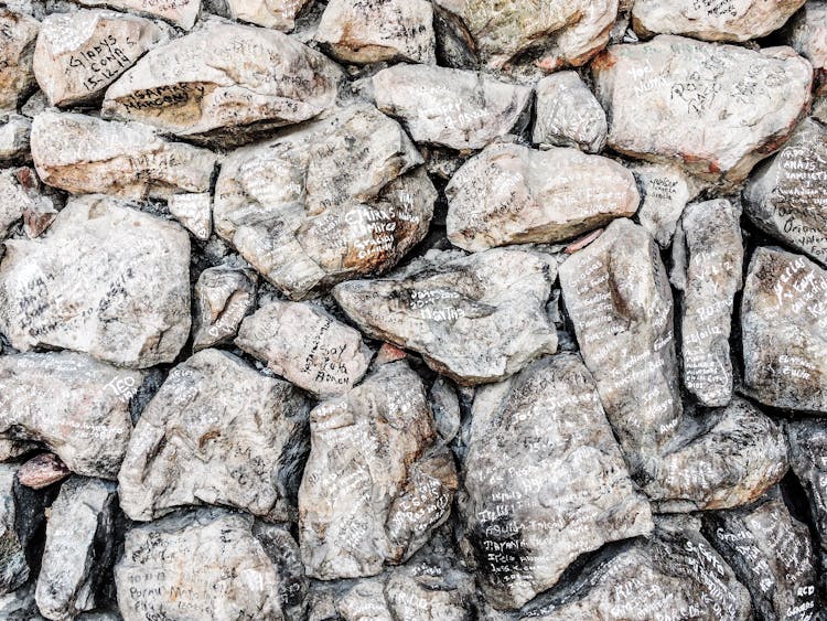 A Pile Of Rocks With Messages